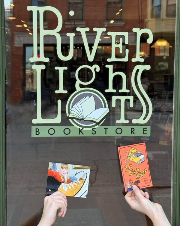 But I'm a Shoe merchandise signed by Janet Varney placed at the River Lights Bookstore in Dubuque Iowa
