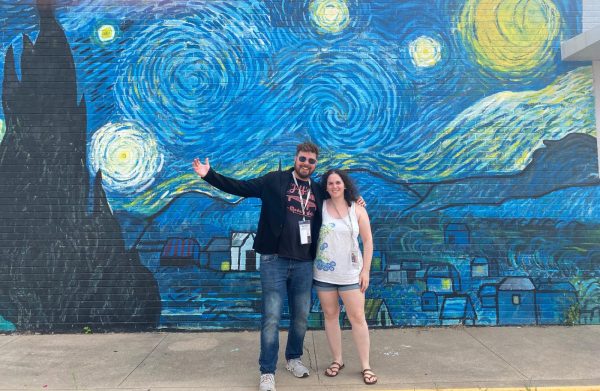 Blood and Sex Over Ambition team, Gregory J.M. Kasunich and Chen Drachman in front of the Van Gogh's Starry Night mural in Waco, TX, during the 2025 Waco Independent Film Festival.