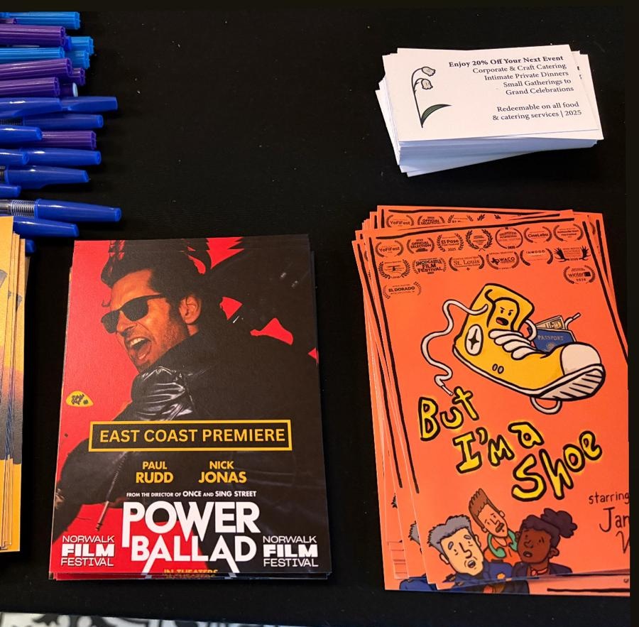 Chen Drachman's "But I'm a Shoe" postcards next to Paul Rudd's "Power Ballad" postcards at the Norwalk Film Festival
